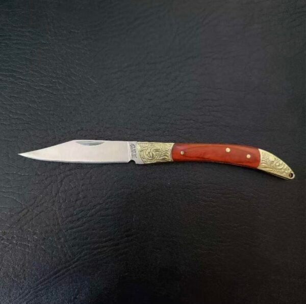 Brass folding knife