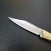 Brass folding knife